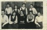 Jauniešu grupa kopā ar mūzikas skolotāju Jefrosinju Cimmermani Jēkabpilī 1947 gada 9. maijā.
1 rindā 2 no kreisās Ņina Auziņa, 2 rindā 1 no labās Elmārs Salgusi.